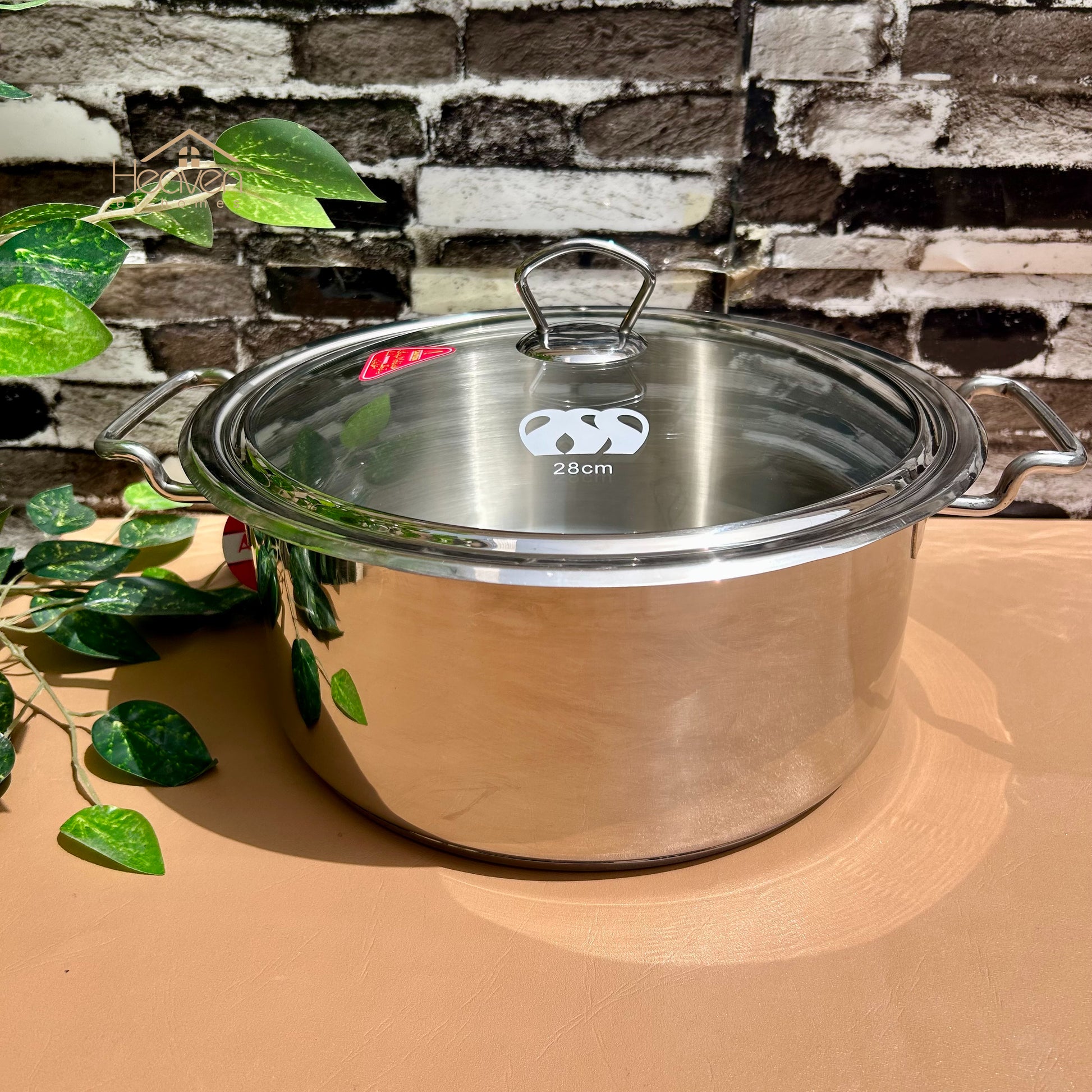 Alpha® Stainless Steel Cooking Pot with Encapsulated Bottom and Tempered Glass Lid – Durable, Even Heat Distribution - Heaven of homes - Sale Pakistan